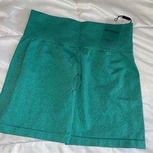 NVGTN turquoise pro shorts